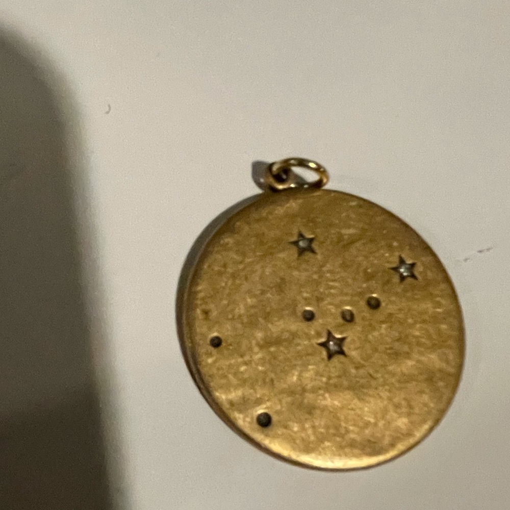 Astrological sign pendant. Gold